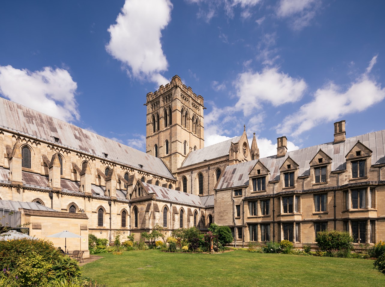 The exterior of the Roman Catholic Cathedral of St John the Baptist in Norwich shows the cathedral tower and nave.