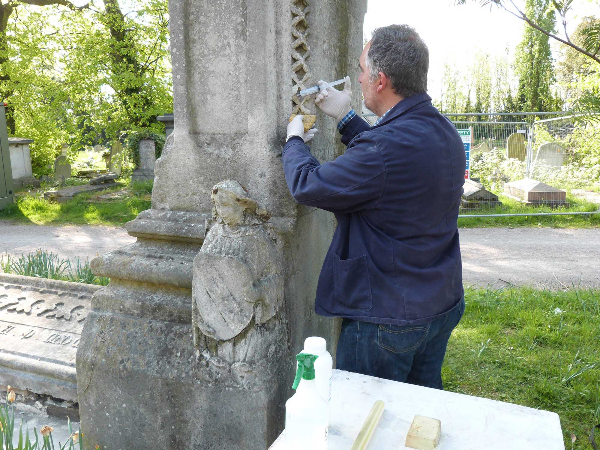 Applying nanolime to a limestone memorial in Kensal Green Cemetery, London